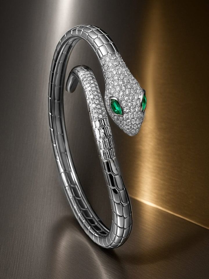 Rubans Rhodium-Plated Cubic Zirconia Snake-Inspired Openable Bracelet with Emerald Accents