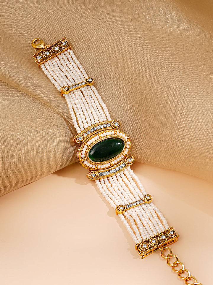 Gold Plated Pearl Beaded Multi Strand Kundan Emerald Centered Bracelet