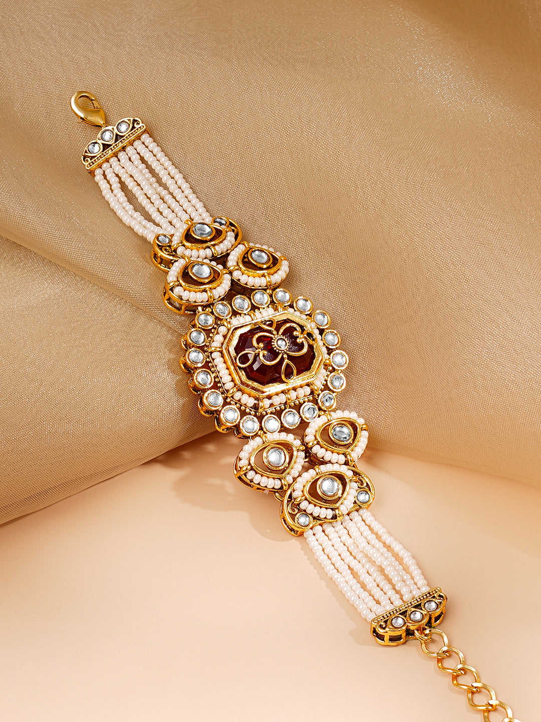 Gold Plated Pearl Beaded Multi Strand Kundan Ruby Centered Bracelet