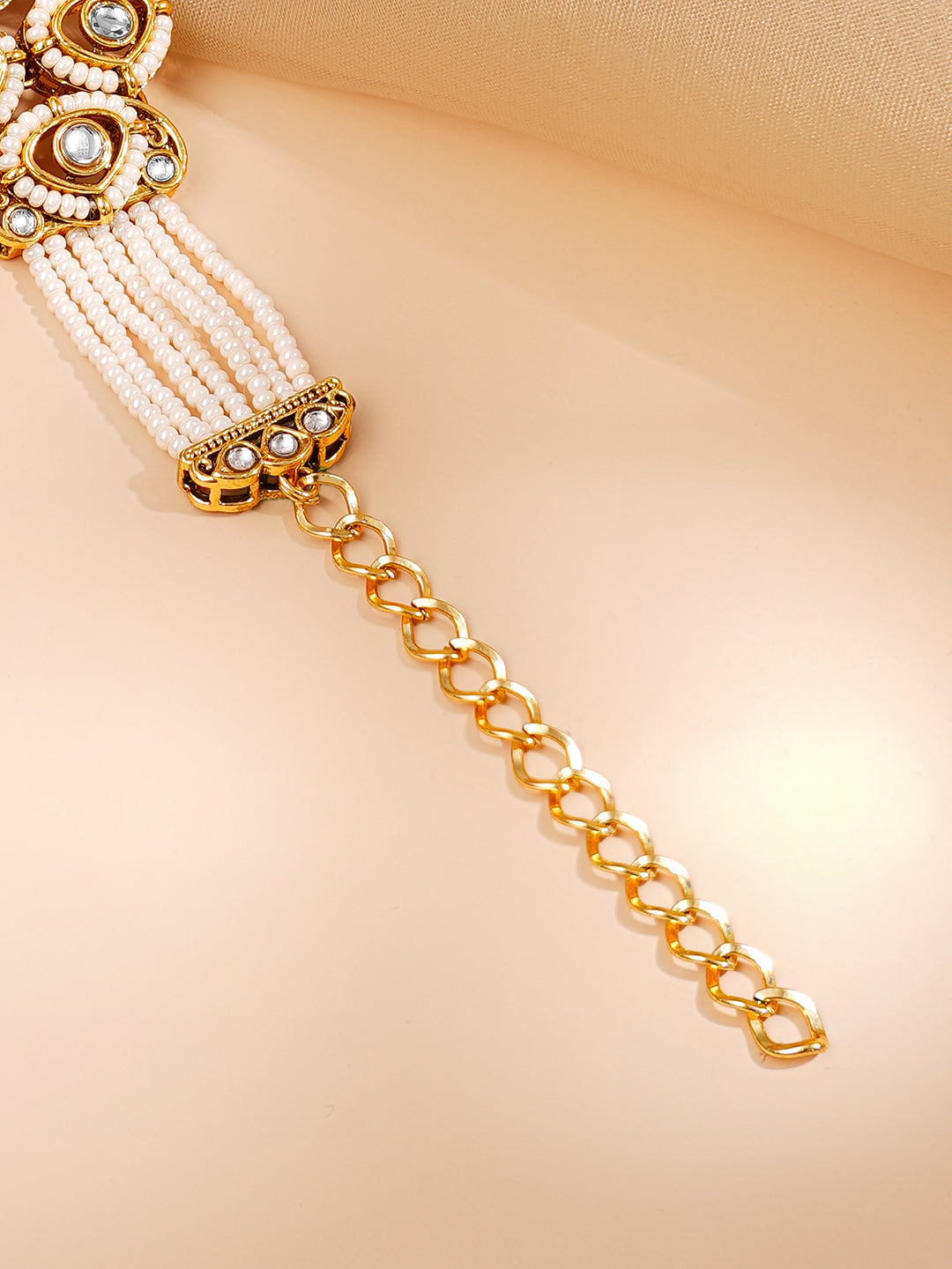 Gold Plated Pearl Beaded Multi Strand Kundan Ruby Centered Bracelet