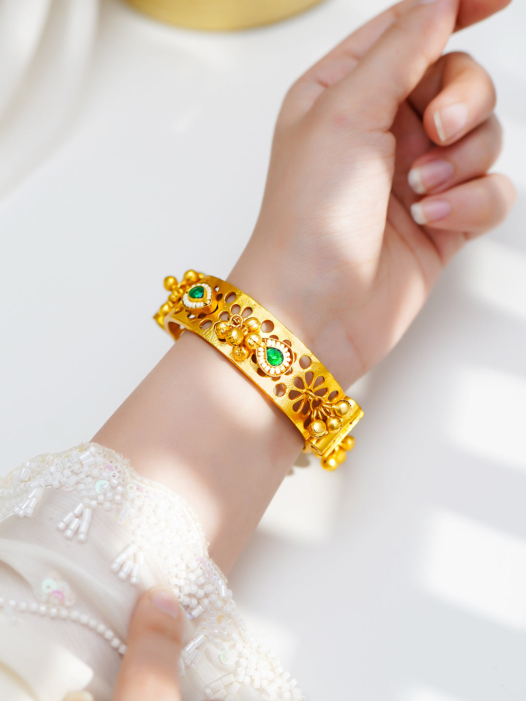 Gold Plated Ghungroo Bracelet with Emerald & Pearl Detailing