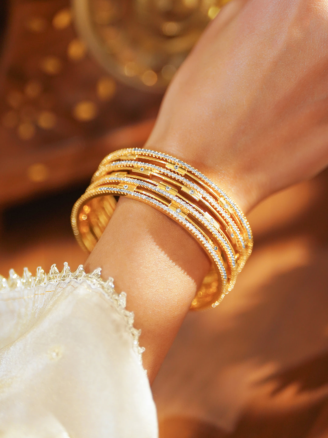American Diamond Zirconia Studded Gold Bangles Set Of 4