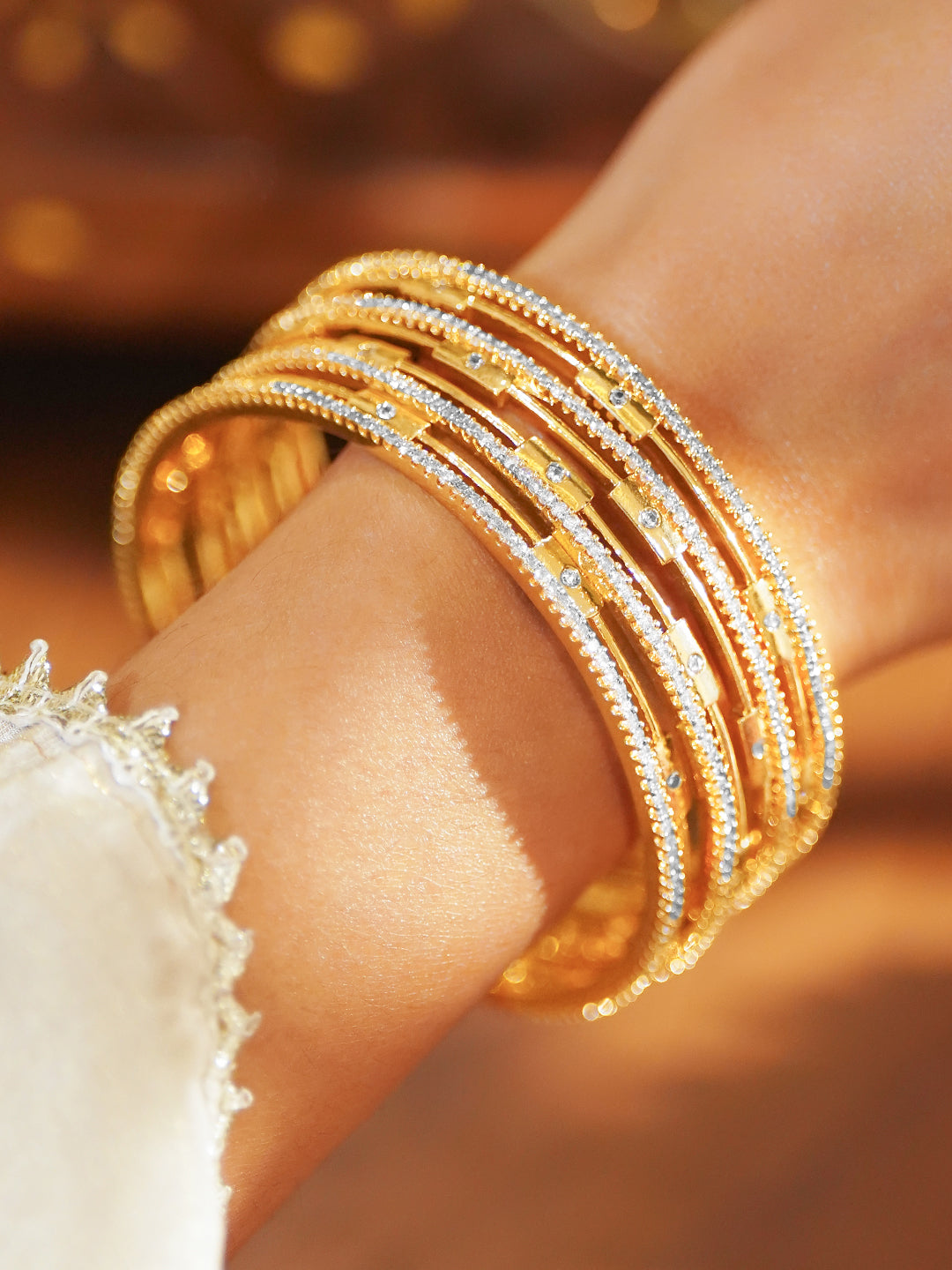 American Diamond Zirconia Studded Gold Bangles Set Of 4