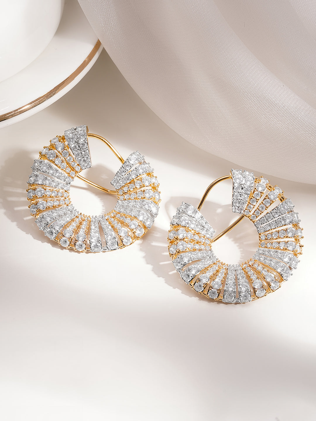 Dula Tone Crystal Radiant Swirl Hoop Earrings