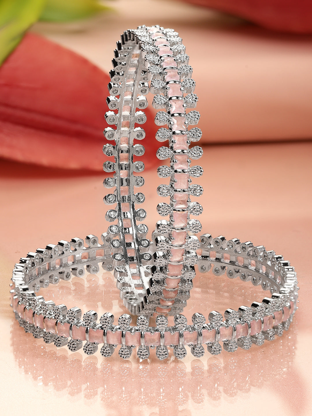 Rhodium-plated bangles adorned with pastel pink and white cubic zirconia Glow Chandelier