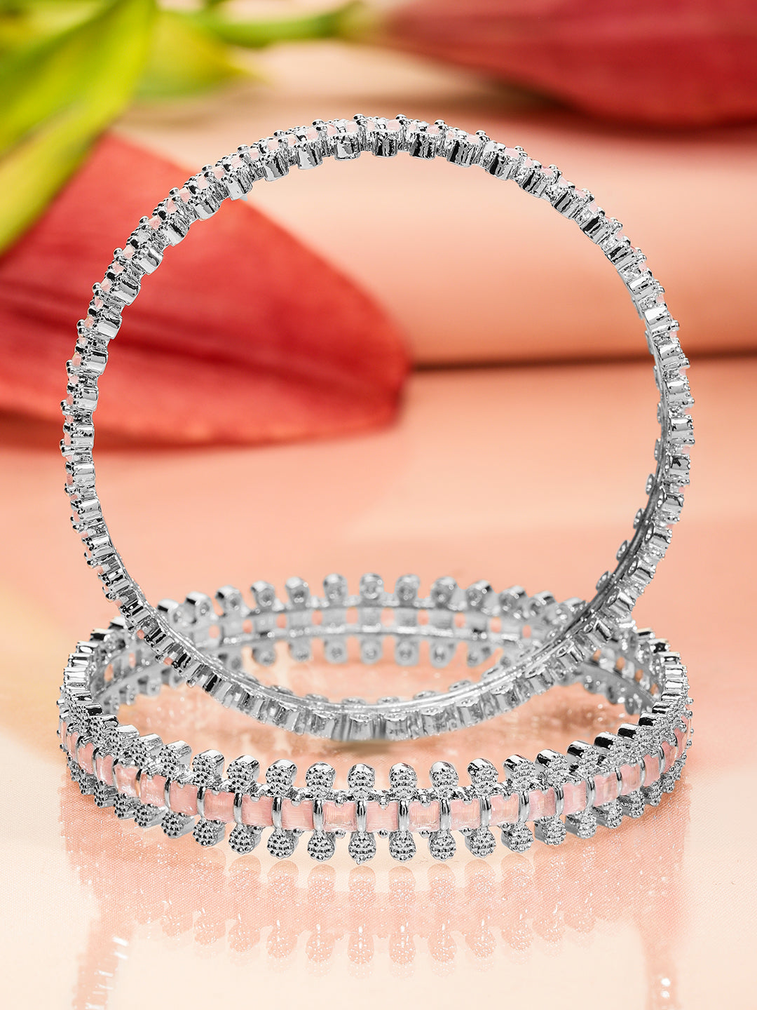 Rhodium-plated bangles adorned with pastel pink and white cubic zirconia Glow Chandelier