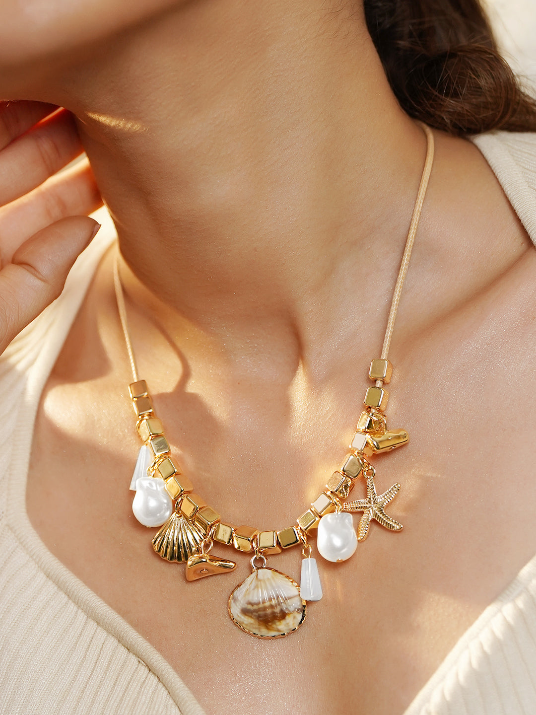 Gold Toned Multi-Charm Necklace