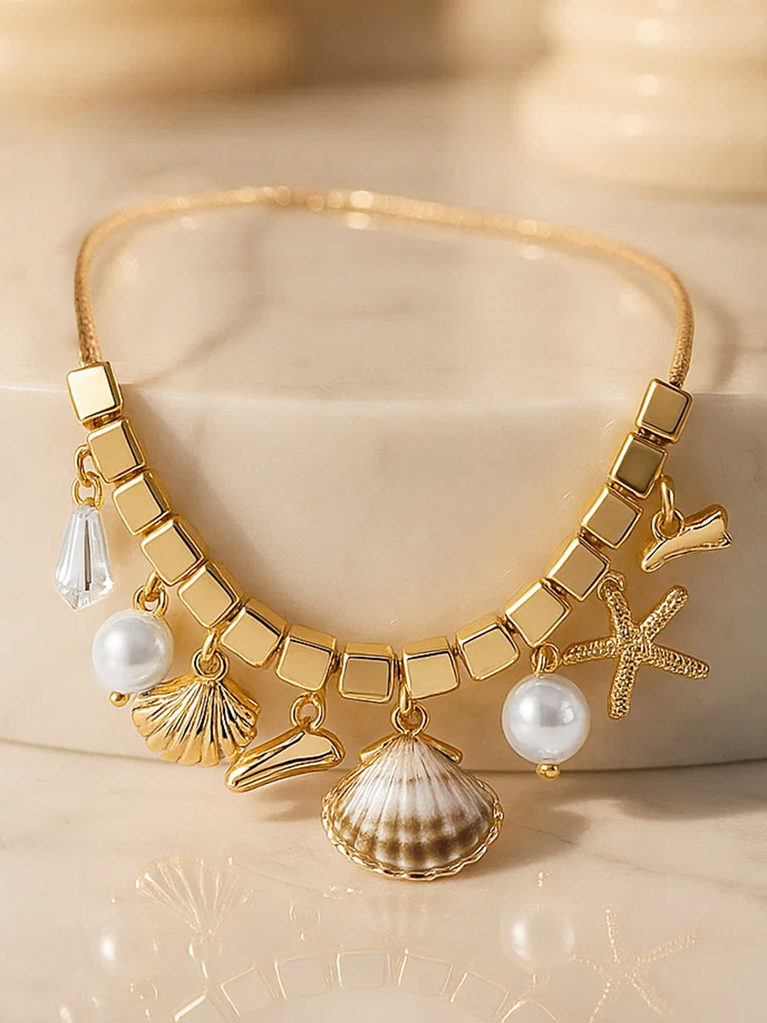 Gold Toned Multi-Charm Necklace