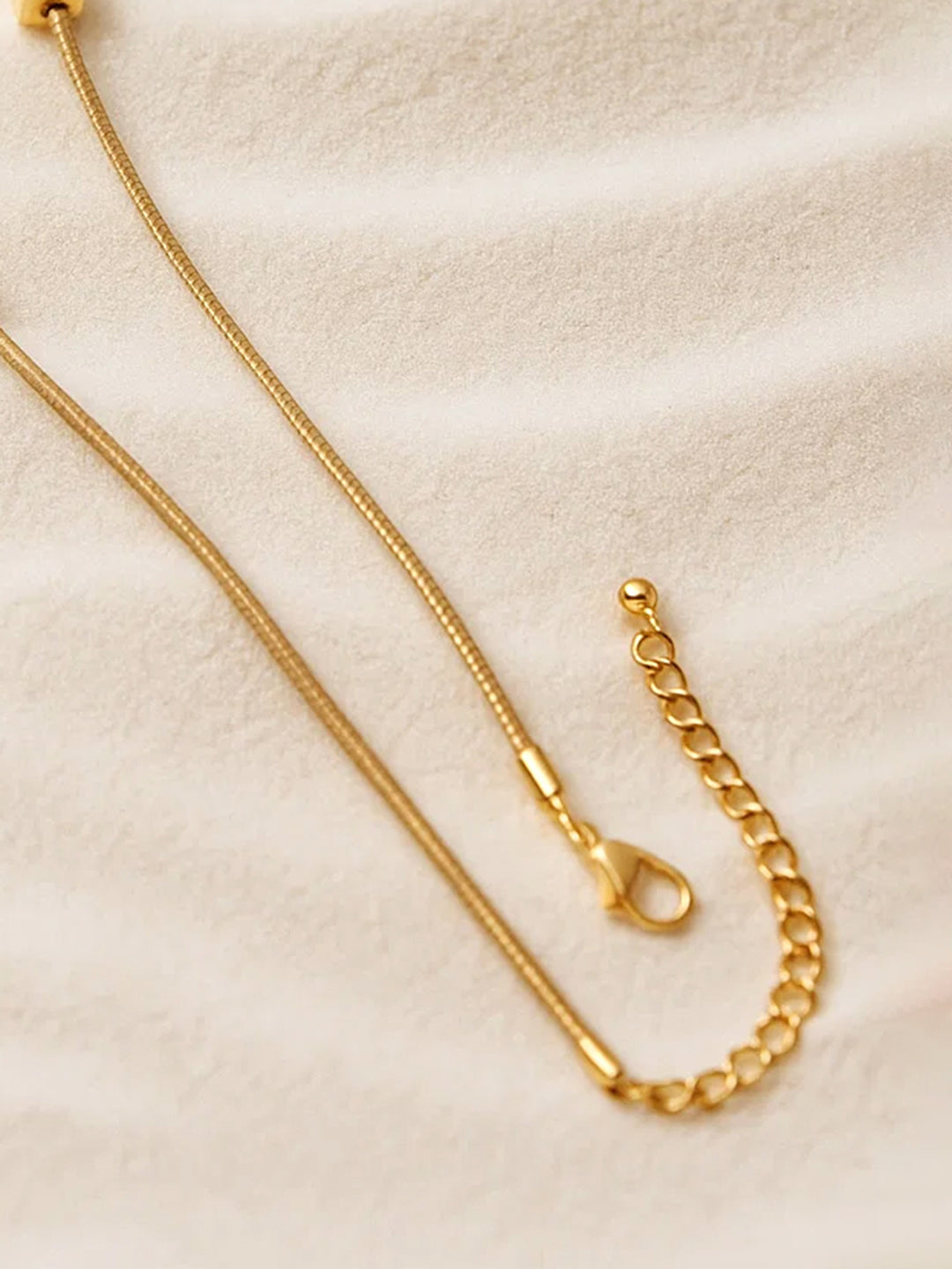 Gold Toned Multi-Charm Necklace