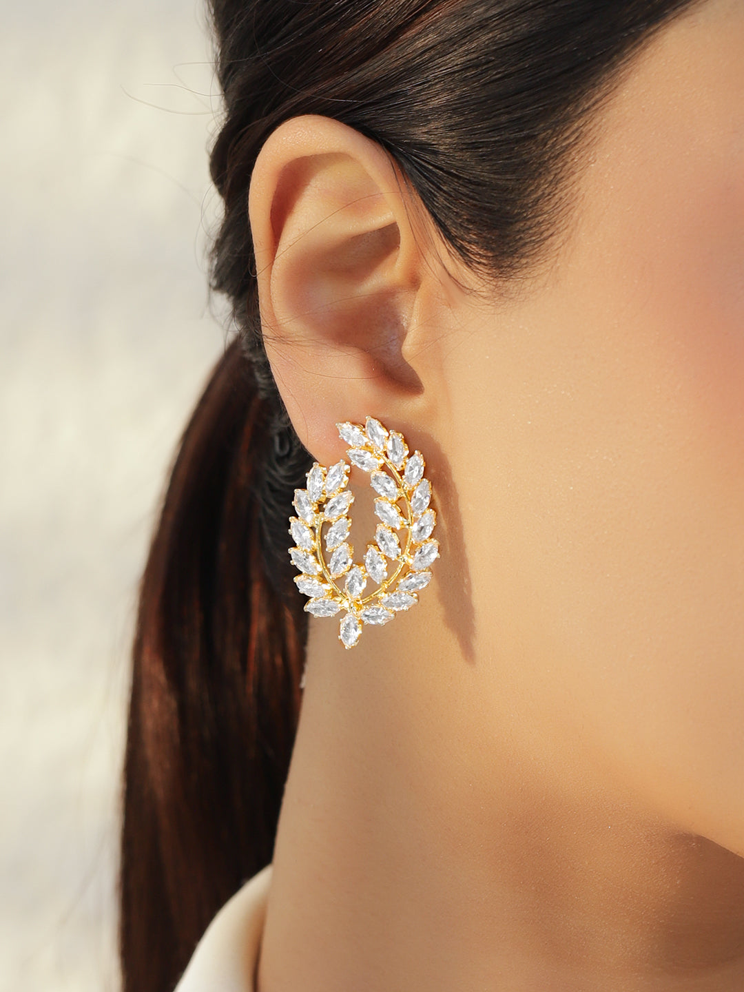 Leaf Motif Gold Toned Crystal Stud Earrings