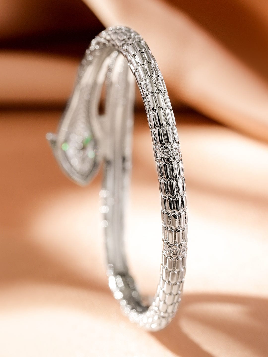 Rubans Rhodium-Plated Cubic Zirconia Snake-Inspired Openable Bracelet with Emerald Accents