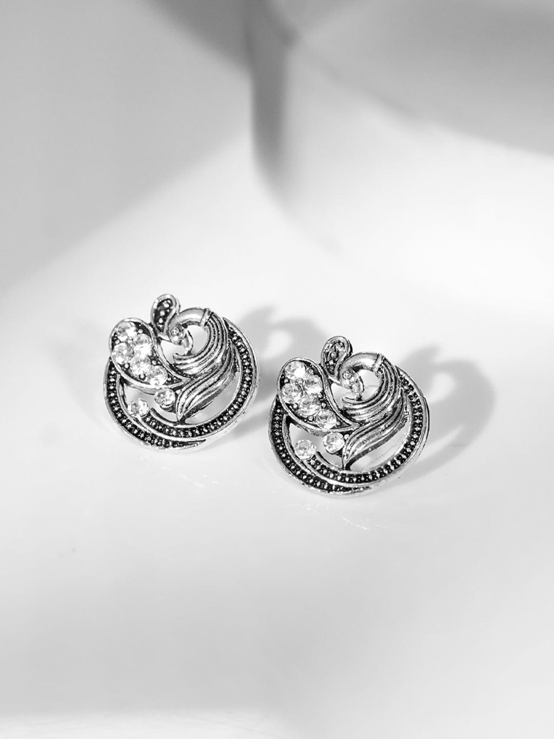 Rubans Silver-Plated American Diamond Studded Peacock Shaped Studs Earrings