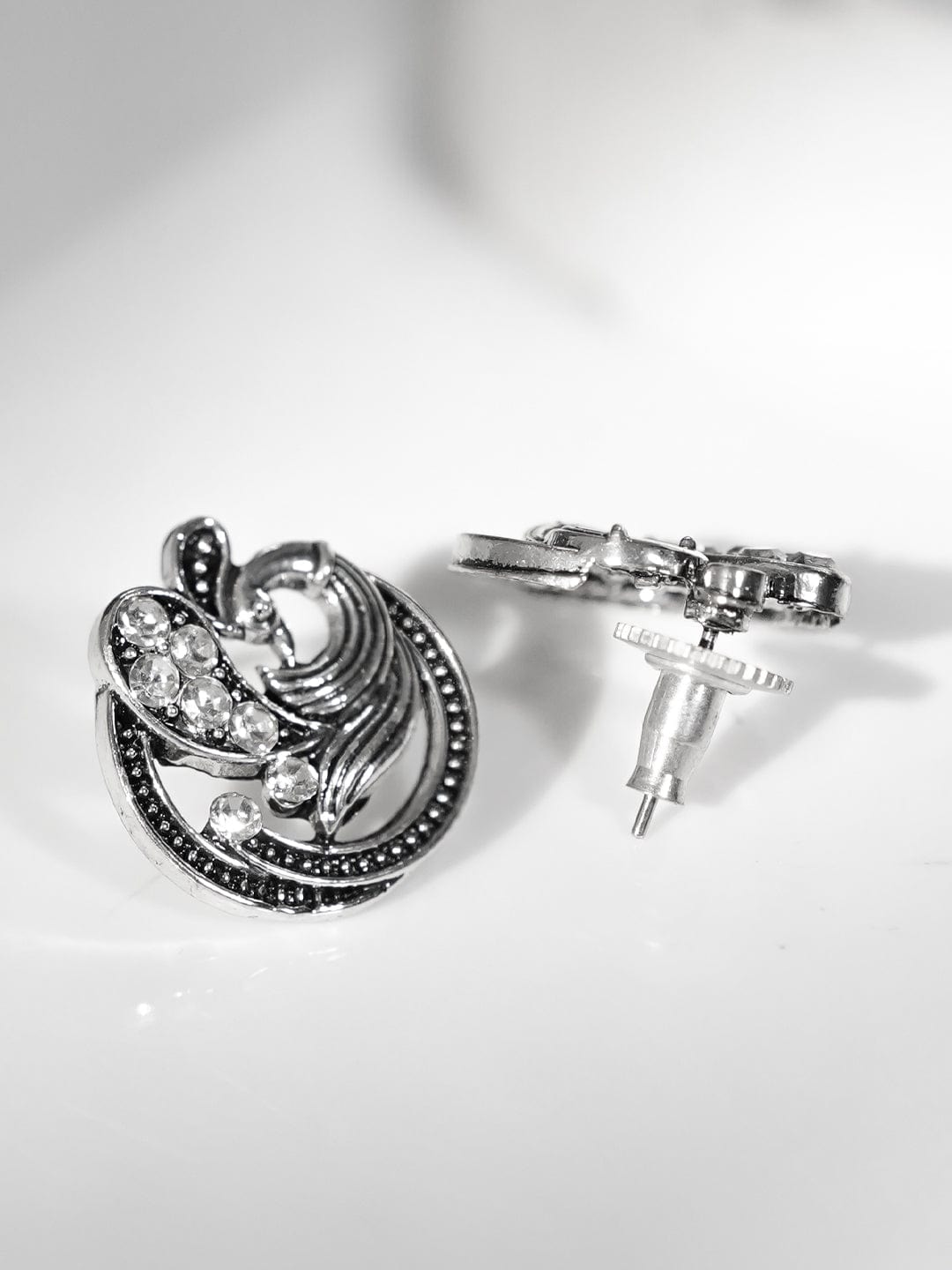 Rubans Silver-Plated American Diamond Studded Peacock Shaped Studs Earrings
