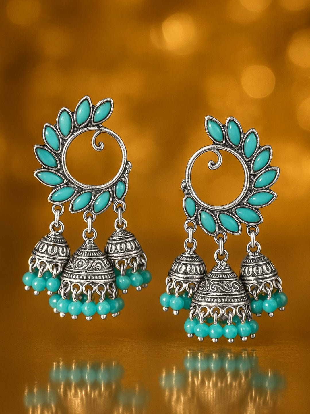 Rubans Silver-Toned & Turquoise Blue Peacock Wing Jhumka Earrings